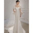 Modern Mermaid Satin Wedding Dresses with Short Puff Sleeves and Stunning Scooped Back